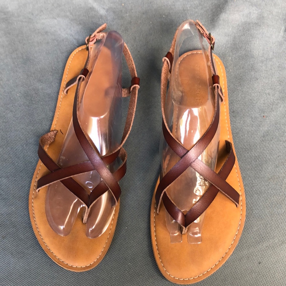 Relational crisscross brown sandals